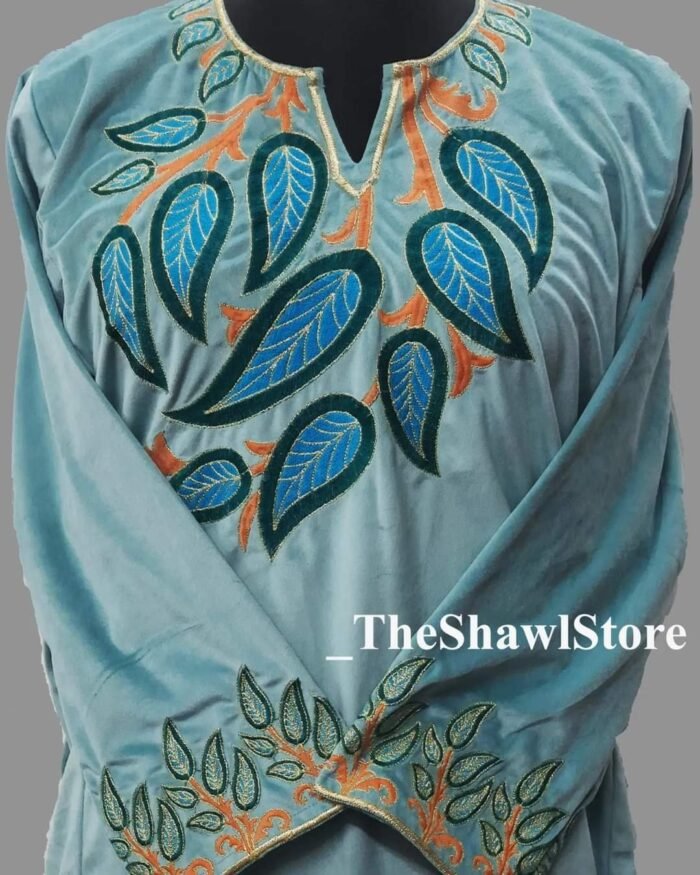 1000062211 4 <p>Experience Traditional Elegance with the C-Sozni Embroidery Pheran from The Shawl Store!<br />
Discover the epitome of traditional elegance with our C-Sozni Embroidery Pheran, now available exclusively at The Shawl Store. Meticulously handcrafted by skilled artisans in the enchanting valleys of Kashmir, this exquisite piece showcases the intricate C-Sozni embroidery technique, boasting delicate motifs and patterns. Crafted with the utmost precision, this Pheran is made from premium-quality, lightweight fabric, providing a comfortable and cozy fit. Elevate your style and embrace the legacy of Kashmiri artistry with our C-Sozni Embroidery Pheran, only at The Shawl Store.</p>