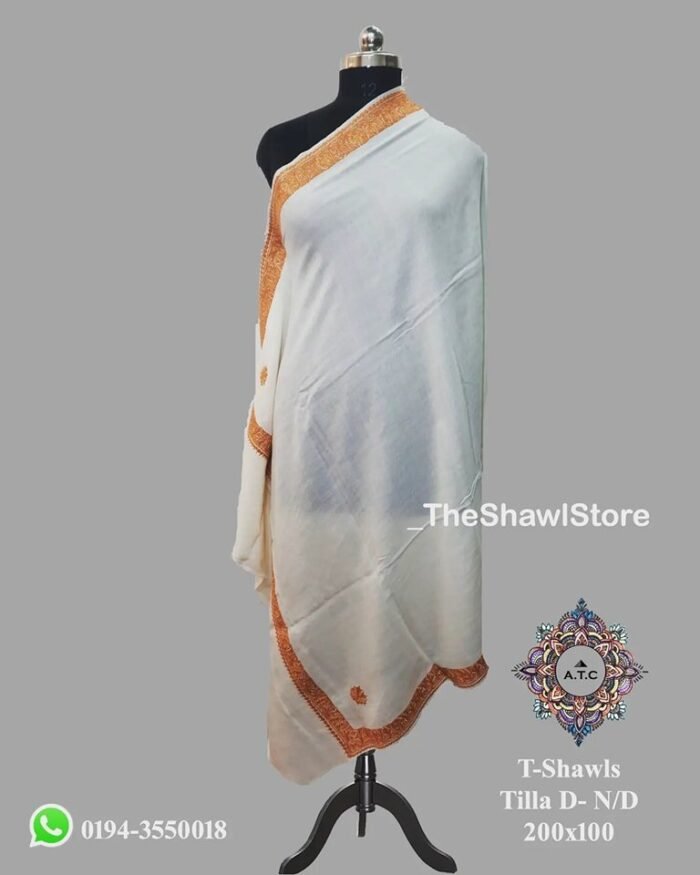 1000062293 1 Indulge in the luxurious comfort of Woolen Shawls with Tilla Embroidery from The Shawl Store! Crafted with care, these shawls are designed to keep you warm without compromising on style. Made from premium quality wool, they provide a soft and cozy feel against your skin. The intricate Tilla Embroidery adds a touch of elegance and charm, making these shawls a perfect accessory for any occasion. Lightweight and easy to carry, they are an ideal choice for travel or everyday use. Elevate your look with the finest selection of Woolen Shawls with Tilla Embroidery, exclusively available at The Shawl Store. <h2></h2>