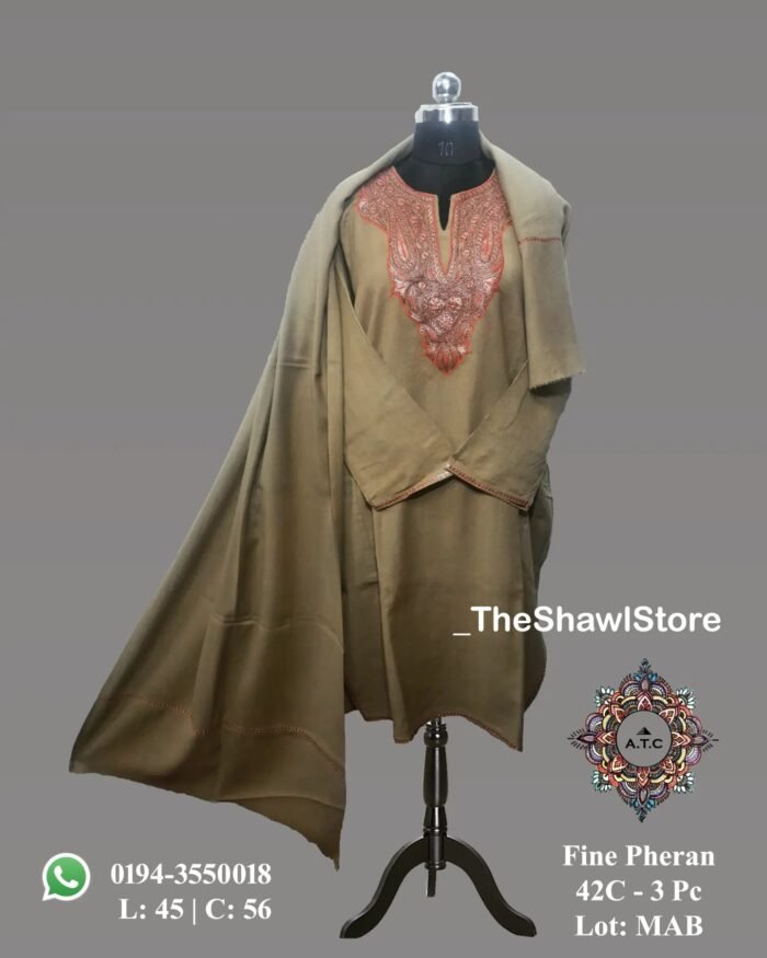 1000063041 <p><strong>Indulge in Elegance with The Shawl Store’s 42 Count Tilla Pheran</strong><br />
Immerse yourself in the opulence of our 42 Count Tilla Pheran from The Shawl Store. This exquisite piece of craftsmanship showcases the intricate beauty of traditional Kashmiri embroidery, harmoniously blending tradition and luxury. Meticulously handwoven using the finest quality fabrics, this pheran effortlessly drapes over your shoulders, enveloping you in sheer elegance. Elevate any ensemble with the soft, supple touch of this luxurious shawl, a testament to timeless style and refined taste.</p>