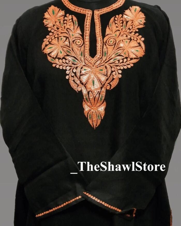 1000063169 9 <p><strong>Indulge in Elegance with The Shawl Store’s 42 Count Tilla Pheran</strong><br />
Immerse yourself in the opulence of our 42 Count Tilla Pheran from The Shawl Store. This exquisite piece of craftsmanship showcases the intricate beauty of traditional Kashmiri embroidery, harmoniously blending tradition and luxury. Meticulously handwoven using the finest quality fabrics, this pheran effortlessly drapes over your shoulders, enveloping you in sheer elegance. Elevate any ensemble with the soft, supple touch of this luxurious shawl, a testament to timeless style and refined taste.</p>