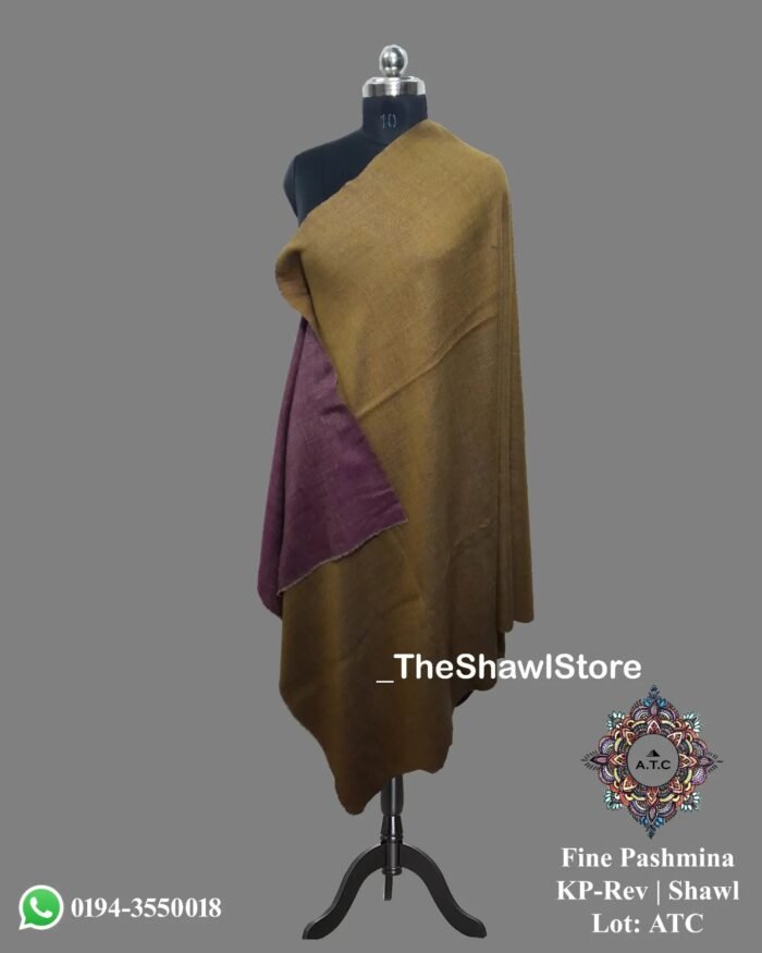 1000063229 3 Discover the epitome of luxury with our handcrafted Pashmina Shawls adorned with mesmerizing weaving, now presented at The Shawl Store. Immerse yourself in the sheer elegance and richness of our artisanal creations that carefully combine the plushness of Pashmina wool with the unparalleled artistry. Draped around your shoulders, these shawls offer the perfect blend of warmth, comfort, and style. Delight in the masterful expertise of our craftsmen and embrace the allure of these exceptional pieces, available exclusively at The Shawl Store.