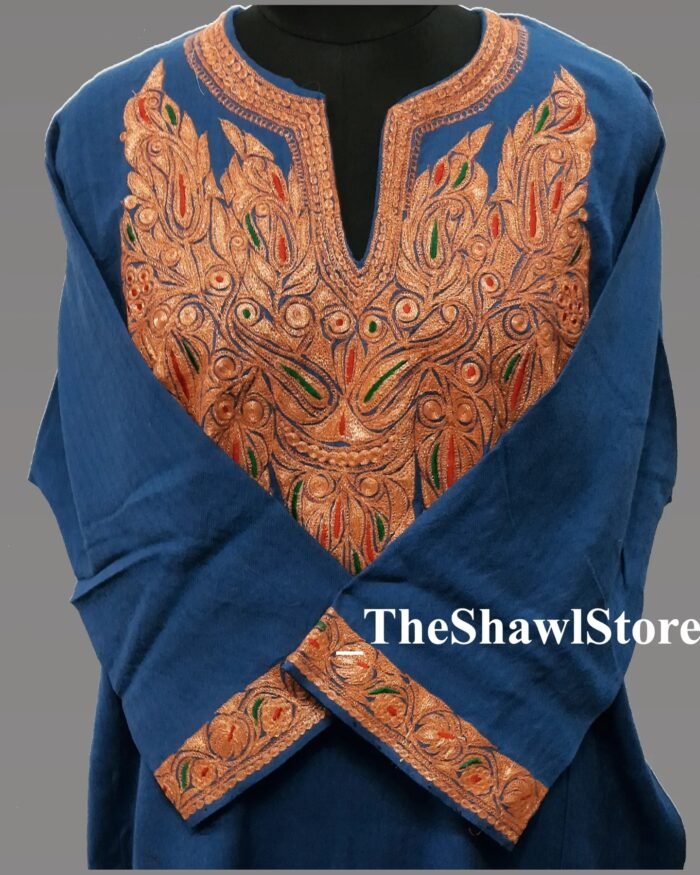 Pheran 400268299 297714353099900 1137810085433735018 n <strong>Indulge in Elegance with The Shawl Store's 42 Count Tilla Pheran</strong> Immerse yourself in the opulence of our 42 Count Tilla Pheran from The Shawl Store. This exquisite piece of craftsmanship showcases the intricate beauty of traditional Kashmiri embroidery, harmoniously blending tradition and luxury. Meticulously handwoven using the finest quality fabrics, this pheran effortlessly drapes over your shoulders, enveloping you in sheer elegance. Elevate any ensemble with the soft, supple touch of this luxurious shawl, a testament to timeless style and refined taste.