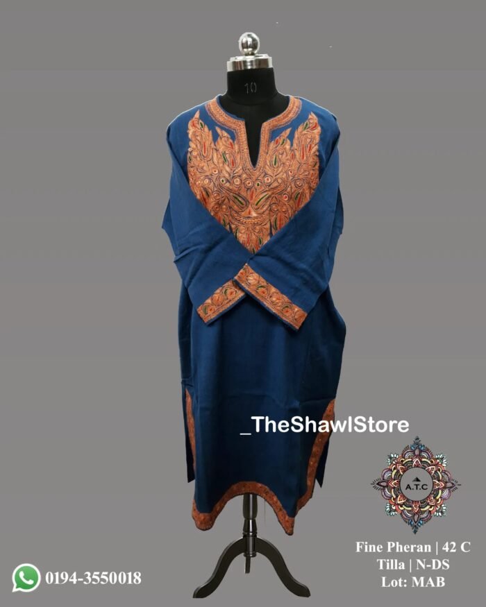 Pheran 400861840 297714356433233 4468317171478491063 n <strong>Indulge in Elegance with The Shawl Store's 42 Count Tilla Pheran</strong> Immerse yourself in the opulence of our 42 Count Tilla Pheran from The Shawl Store. This exquisite piece of craftsmanship showcases the intricate beauty of traditional Kashmiri embroidery, harmoniously blending tradition and luxury. Meticulously handwoven using the finest quality fabrics, this pheran effortlessly drapes over your shoulders, enveloping you in sheer elegance. Elevate any ensemble with the soft, supple touch of this luxurious shawl, a testament to timeless style and refined taste.