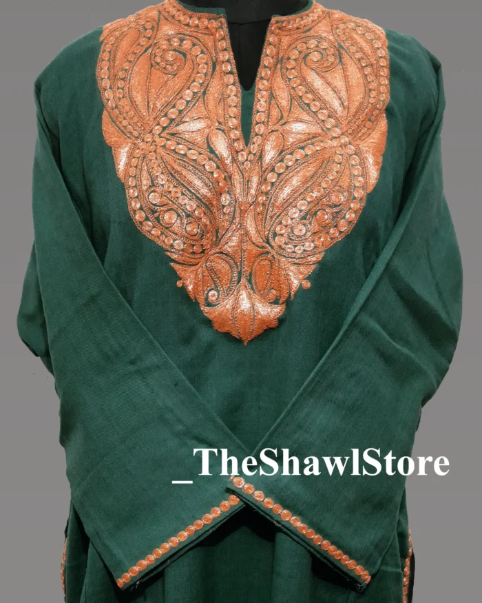 1000065411 10 <p><strong>Indulge in Elegance with The Shawl Store’s 42 Count Tilla Embroidery Pheran</strong><br />
Immerse yourself in the opulence of our 42 Count Tilla Embroidery Kashmiri Pheran from The Shawl Store. This exquisite piece of craftsmanship showcases the intricate beauty of traditional Kashmiri embroidery, harmoniously blending tradition and luxury. Meticulously handwoven using the finest quality fabrics, this pheran effortlessly drapes over your shoulders, enveloping you in sheer elegance. Elevate any ensemble with the soft, supple touch of this luxurious shawl, a testament to timeless style and refined taste.</p>