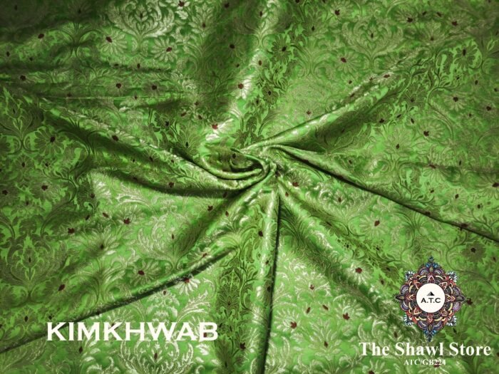 1000080572 Indulge in the timeless beauty of Pure Silk Kimkhab Fabric, exclusively available at The Shawl Store. Crafted from the finest silk, this Brocade Banarasi fabric boasts a rich texture and intricate brocade work that is sure to make a statement. Whether for a special occasion or everyday wear, this luxurious fabric is a must-have for any fashion enthusiast. <strong><em>Quantity: </em></strong><em>1 Piece/Unit = 1 Metre</em>