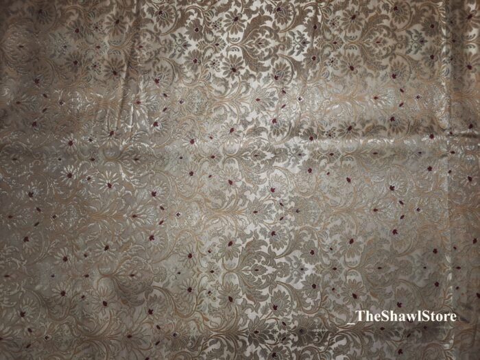 IMG 20240424 190213 669 Indulge in the timeless beauty of Pure Silk Kimkhab Fabric, exclusively available at The Shawl Store. Crafted from the finest silk, this Brocade Banarasi fabric boasts a rich texture and intricate brocade work that is sure to make a statement. Whether for a special occasion or everyday wear, this luxurious fabric is a must-have for any fashion enthusiast. <strong><em>Quantity: </em></strong><em>1 Piece/Unit = 1 Metre</em>