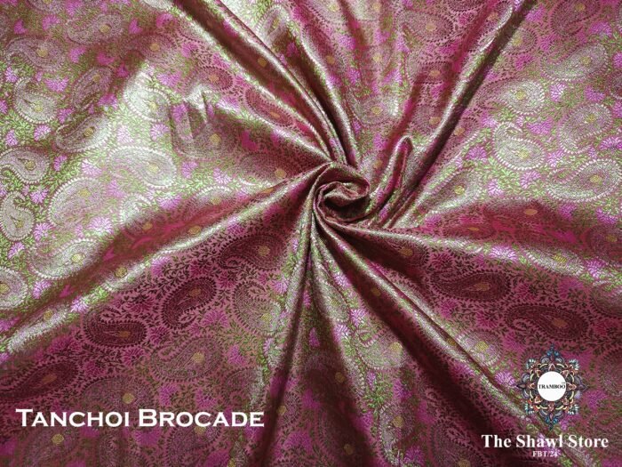 1724662718343 scaled Experience the epitome of luxury with Tanchoi Brocade, available exclusively at The Shawl Store. Impeccably woven with a blend of silk and metallic threads, this stunning shawl features a delicate pattern that adds a touch of grandeur to any outfit. Treat yourself to the lavish beauty of Tanchoi Brocade from The Shawl Store. <strong><em>Quantity: </em></strong><em>1 Piece/Unit = 1 Metre</em>