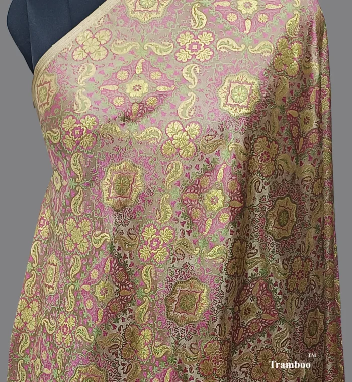 1724669685273 Experience the epitome of luxury with Tanchoi Brocade, available exclusively at The Shawl Store. Impeccably woven with a blend of silk and metallic threads, this stunning shawl features a delicate pattern that adds a touch of grandeur to any outfit. Treat yourself to the lavish beauty of Tanchoi Brocade from The Shawl Store. <strong><em>Quantity: </em></strong><em>1 Piece/Unit = 1 Metre</em>