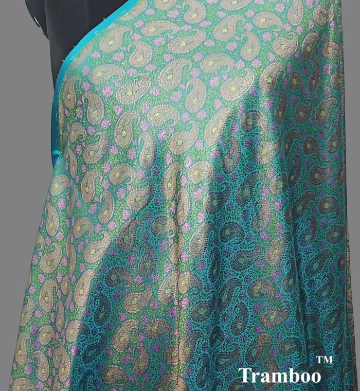 1724922670005 Experience the epitome of luxury with Tanchoi Brocade, available exclusively at The Shawl Store. Impeccably woven with a blend of silk and metallic threads, this stunning shawl features a delicate pattern that adds a touch of grandeur to any outfit. Treat yourself to the lavish beauty of Tanchoi Brocade from The Shawl Store. <strong><em>Quantity: </em></strong><em>1 Piece/Unit = 1 Metre</em>