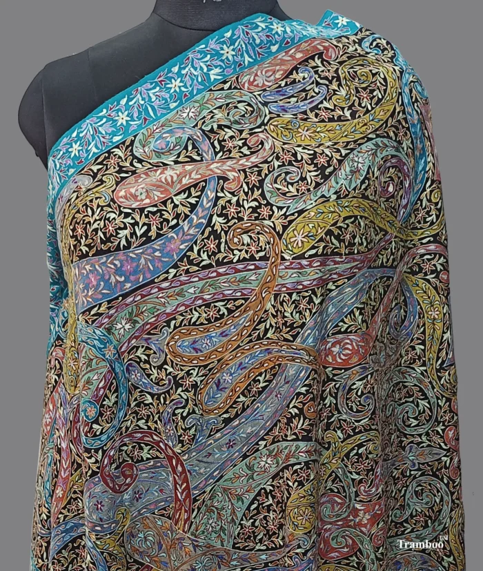 IMG 20240802 192955 208 Indulge in the luxurious craftsmanship of The Shawl Store's Pure Pashmina Hand KalamKari Shawl. Hand-painted and embroidered with precision, this exquisite piece is a true work of art. Elevate your style with this lightweight shawl that embodies opulence and refinement. Make a statement with every wear and exude timeless elegance.