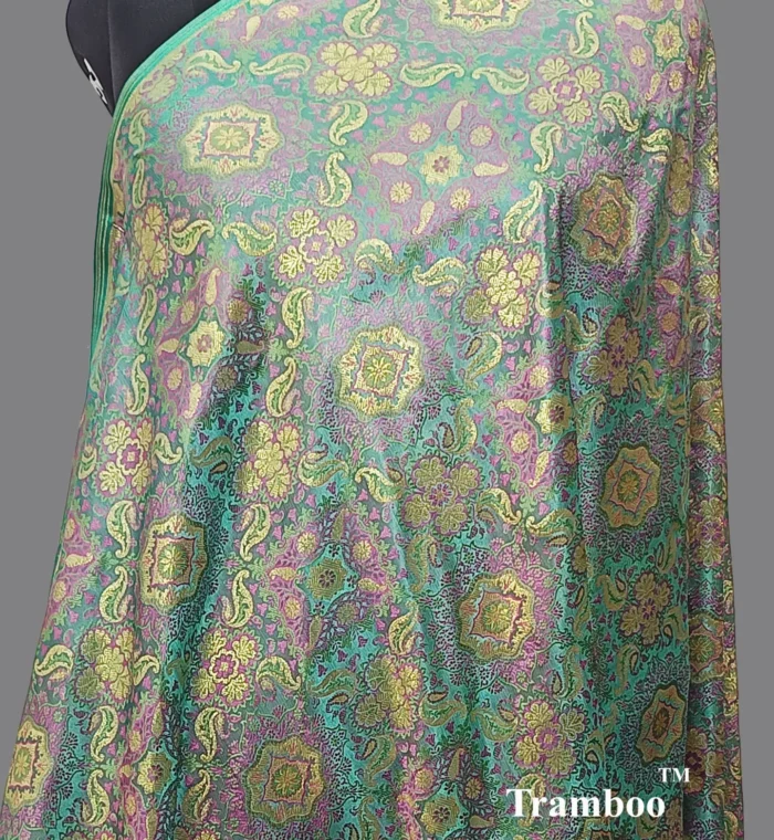 IMG 20240828 211040 976 Experience the epitome of luxury with Tanchoi Brocade, available exclusively at The Shawl Store. Impeccably woven with a blend of silk and metallic threads, this stunning shawl features a delicate pattern that adds a touch of grandeur to any outfit. Treat yourself to the lavish beauty of Tanchoi Brocade from The Shawl Store. <strong><em>Quantity: </em></strong><em>1 Piece/Unit = 1 Metre</em>