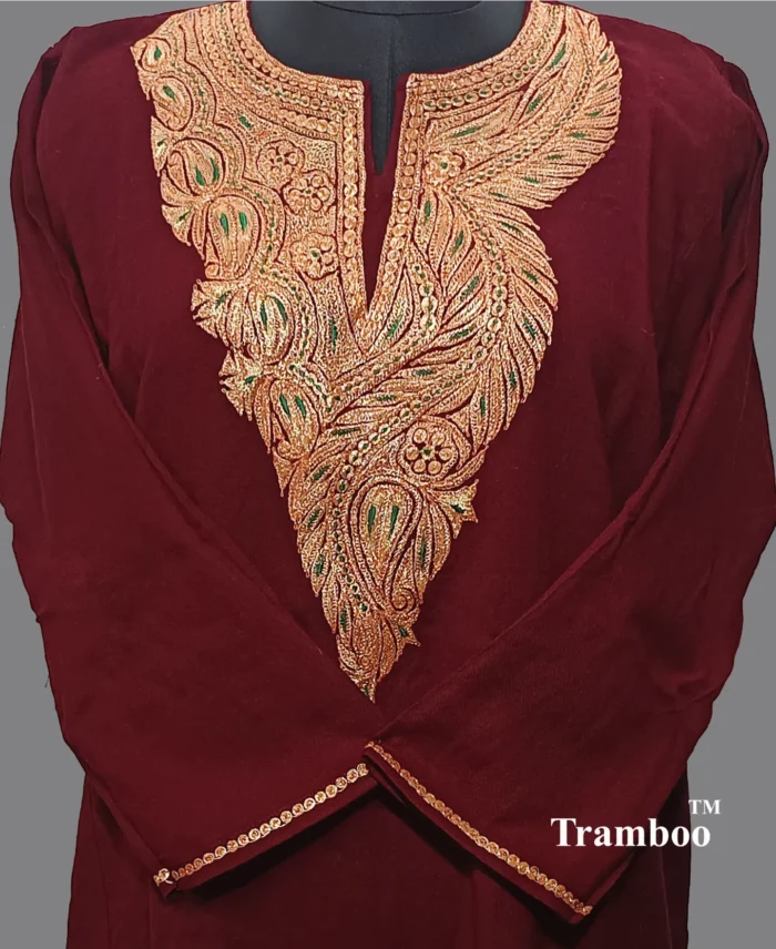 1726921800449 <p style="text-align: left;"><strong>Indulge in Elegance with The Shawl Store’s 42 Count Wool Tilla Embroidery Pheran</strong></p> Immerse yourself in the opulence of our 42 Count Wool Tilla Embroidery Kashmiri Pheran from The Shawl Store. This exquisite piece of craftsmanship showcases the intricate beauty of traditional Kashmiri embroidery, harmoniously blending tradition and luxury. Meticulously handwoven using the finest quality fabrics, this pheran effortlessly drapes over your shoulders, enveloping you in sheer elegance. Elevate any ensemble with the soft, supple touch of this luxurious shawl, a testament to timeless style and refined taste.