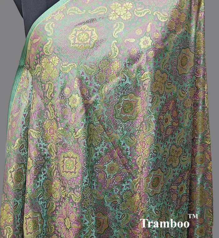 IMG 20240904 060138 722 Experience the epitome of luxury with Tanchoi Brocade, available exclusively at The Shawl Store. Impeccably woven with a blend of silk and metallic threads, this stunning shawl features a delicate pattern that adds a touch of grandeur to any outfit. Treat yourself to the lavish beauty of Tanchoi Brocade from The Shawl Store. <strong><em>Quantity: </em></strong><em>1 Piece/Unit = 1 Metre</em>