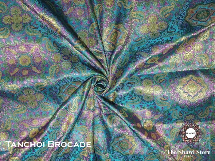 IMG 20240912 075656 000 scaled Experience the epitome of luxury with Tanchoi Brocade, available exclusively at The Shawl Store. Impeccably woven with a blend of silk and metallic threads, this stunning shawl features a delicate pattern that adds a touch of grandeur to any outfit. Treat yourself to the lavish beauty of Tanchoi Brocade from The Shawl Store. <strong><em>Quantity: </em></strong><em>1 Piece/Unit = 1 Metre</em>