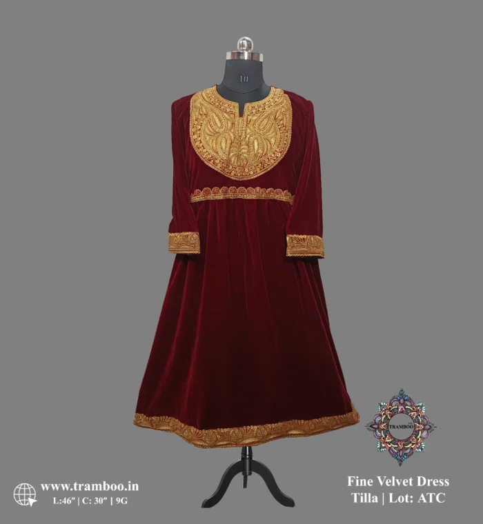 1730294477250 Indulge in unparalleled luxury with the Maroon Color Tilla Embroidery Velvet Dress from Kashmiri by The Shawl Store. Impeccably crafted with fine attention to detail, this gown features intricate Tilla embroidery on sumptuous velvet fabric. Elevate your style and leave a lasting impression with this stunning piece that is perfect for any formal occasion.