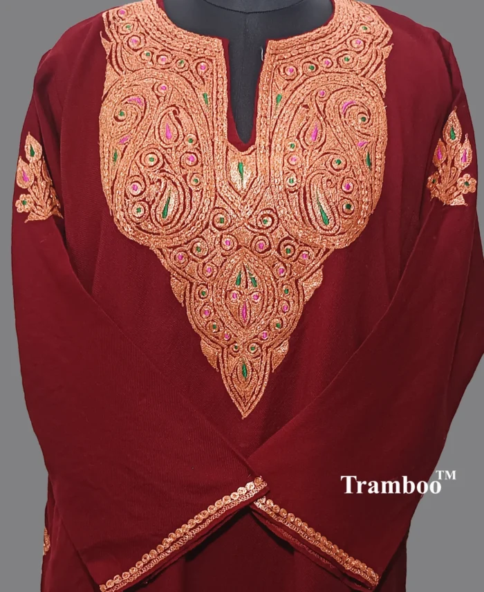 1731501680933 <p style="text-align: left;"><strong>Indulge in Elegance with The Shawl Store’s 42 Count Wool Tilla Embroidery Pheran</strong></p> Immerse yourself in the opulence of our 42 Count Wool Tilla Embroidery Kashmiri Pheran from The Shawl Store. This exquisite piece of craftsmanship showcases the intricate beauty of traditional Kashmiri embroidery, harmoniously blending tradition and luxury. Meticulously handwoven using the finest quality fabrics, this pheran effortlessly drapes over your shoulders, enveloping you in sheer elegance. Elevate any ensemble with the soft, supple touch of this luxurious shawl, a testament to timeless style and refined taste.