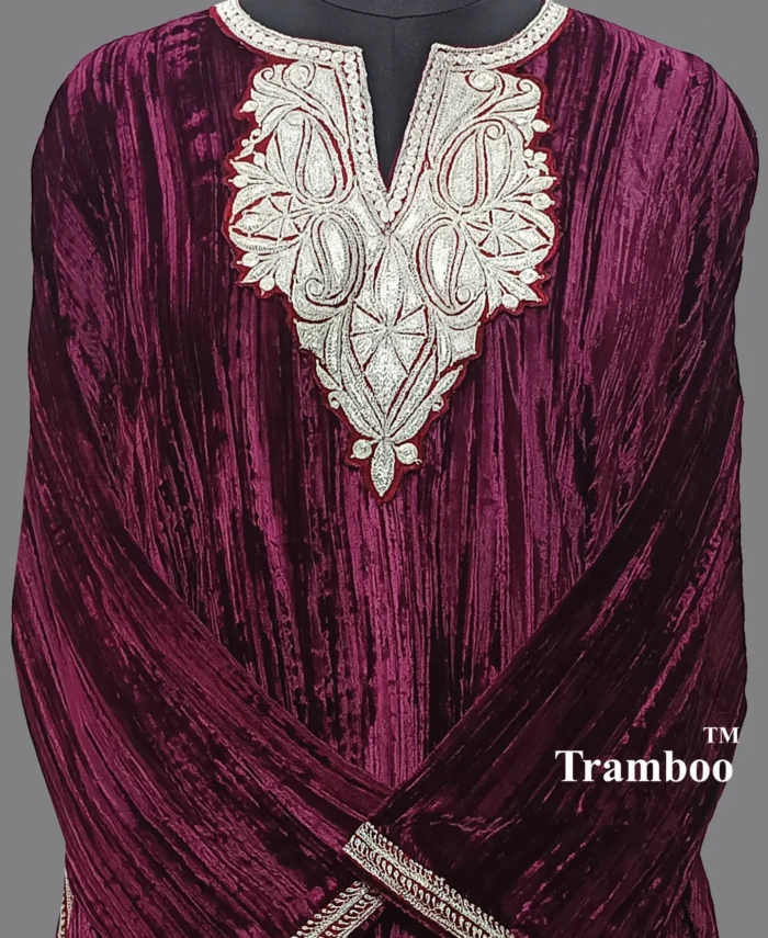 1731580303246 Looking for a statement piece that effortlessly combines tradition and modernity? Look no further than The Shawl Store’s Tilla Embroidery Velvet Pheran! This mesmerizing Kashmiri garment is designed to enhance your style quotient and keep you snug at the same time. The rich velvet fabric provides a soft texture against your skin, while the intricate Tilla embroidery exudes grace and sophistication. With its lightweight and breathable design, this Pheran allows you to look effortlessly chic, be it during festive celebrations or casual outings. Experience the elegance of Kashmiri craftsmanship and make heads turn with this enchanting piece, available exclusively at The Shawl Store!